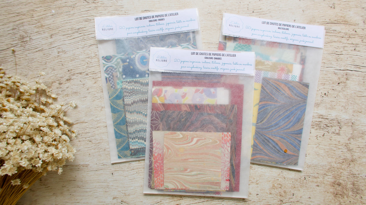 Collection de packs de papier aquarelle et décoratifs issus des carnets créés à l'atelier